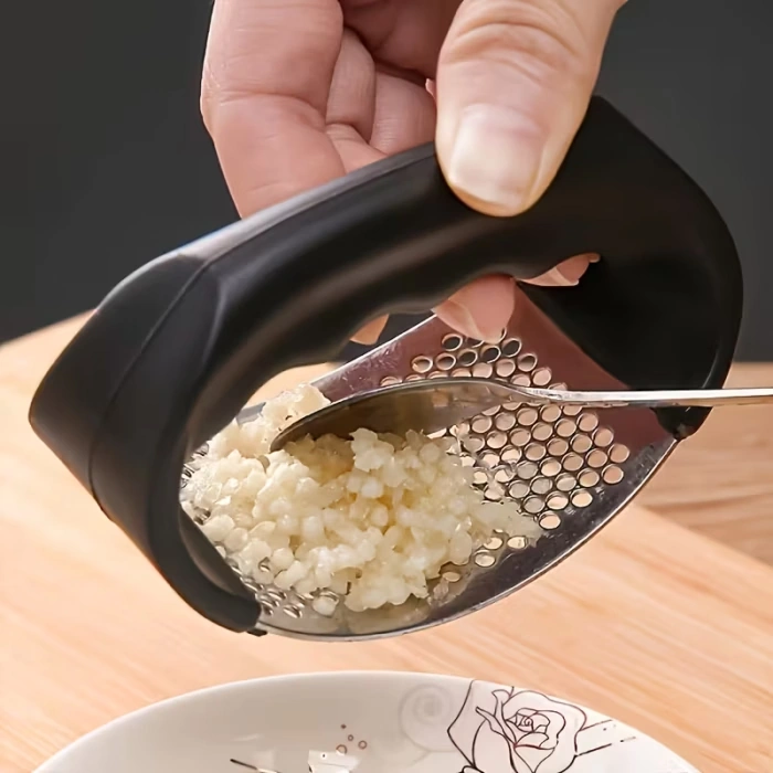 Stainless Steel Garlic Press for Crushing and Mincing with Manual Operation – description image 1